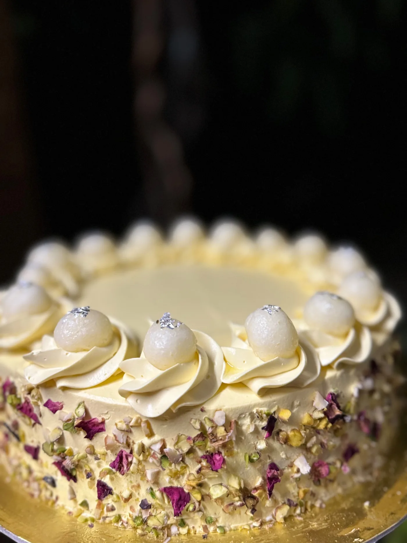 Rasmalai Cake — saffron-cardamom cake with rasmalai, pistachio and rose petals